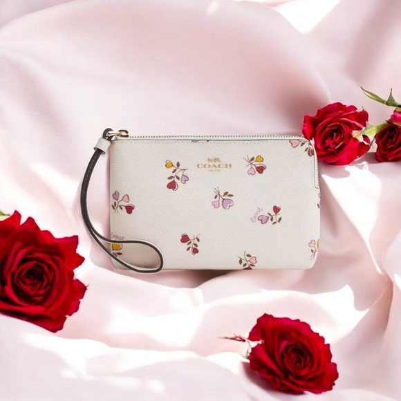 Coach Handbags - Coach Corner Zip Wristlet in Heart Pattern